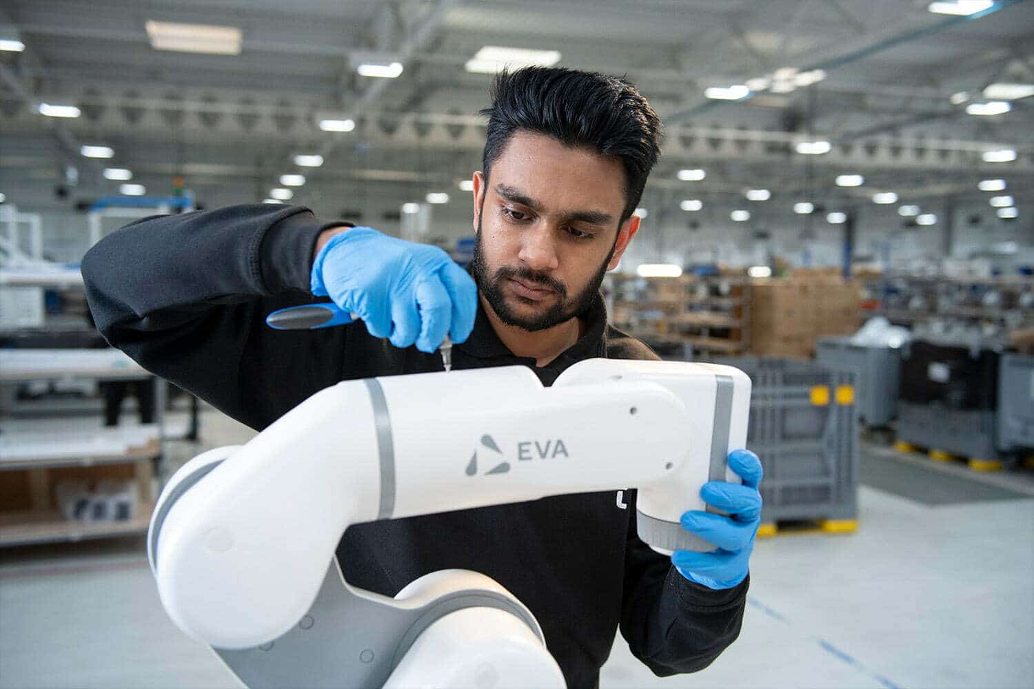 Engineer selecting parts to built a robot