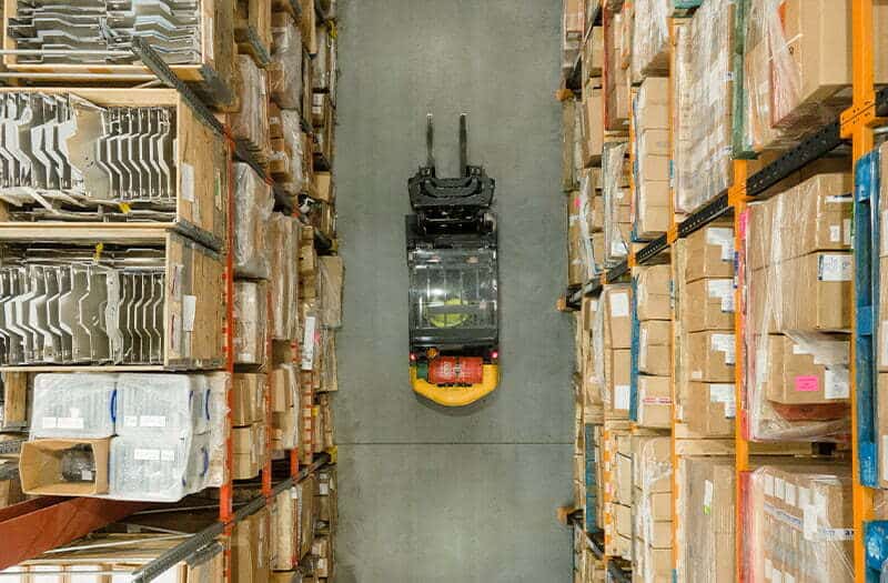 A forklift at work in a warehouse 