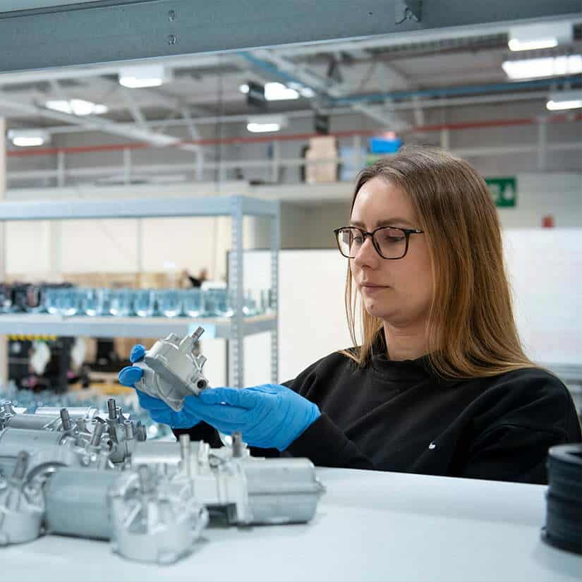 Engineer selecting parts to built a robot