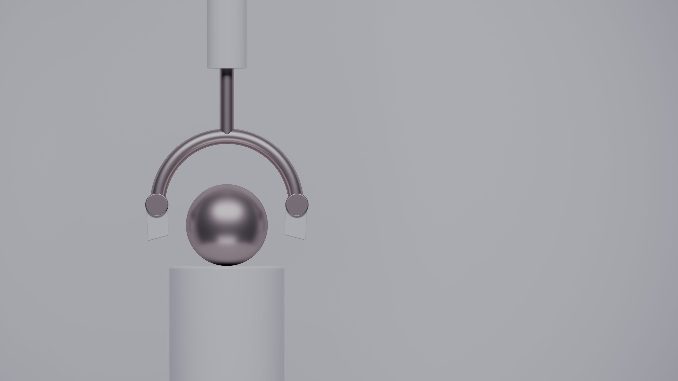 Metallic sphere suspended by a precision tool, symbolising the voices and expertise of Tharsus employees.